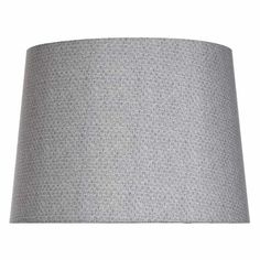 a grey lamp shade on a white background