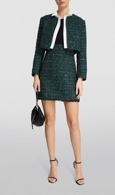 This bold, daring suit combines the classic elegance of tweed with the modern flair of a mini dress. Perfect for those who are not afraid to stand out and make a statement. Elevate your style game with this unique and chic ensemble. Bolero jacket: spread collar, button front closures, long sleeves, attached layered effect shirt, removable Dress: Round neck; zipper closure; three-quarter length sleeves; contrast at top, tweed skirt with fringe trim Dress and jacket set lined Upper main fabric: 95 Chic Mini-length Tweed Dress, Chic Mini Length Tweed Dress, Winter Workwear Tweed Mini Dress, Winter Tweed Mini Dress For Work, Chic Tweed Skirt Suit For Formal Occasions, Fall Tweed Mini Dress For Work, Chic Mini Length Tweed Dress For Work, Chic Tweed Skirt Suit For Office, Chic Tweed Mini Dress For Office