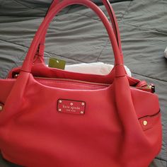 Kate Spade Red Handbag Nwt Red Double Handle Bag, Kate Spade Red Rectangular Shoulder Bag, Luxury Red Kate Spade Shoulder Bag, Red Travel Bags With Gold-tone Hardware, Red Satchel With Removable Pouch For Shopping, Red Satchel With Top Carry Handle For Shopping, Kate Spade Red Crossbody Shoulder Bag, Kate Spade Red Satchel Bag, Red Kate Spade Shopping Bag