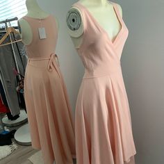 Pastel In Color Peach, Baby Pink, Blush Wraps Around And Is Adjustable V Neck Sleeveless Nice Thick, Heavy Stretch Material Brand: Loving Things Pink Sleeveless Dress For Bridesmaid, Apricot Sleeveless Spring Dresses, Pink A-line Sleeveless Dress For Spring, Sleeveless Pink Bridesmaid Dress, Apricot Sleeveless Midi Dress For Party, Sleeveless Apricot Dress For Garden Party, Apricot Sleeveless Dress For Garden Party, Chic Sleeveless Apricot Dress, Peach Sleeveless Sundress