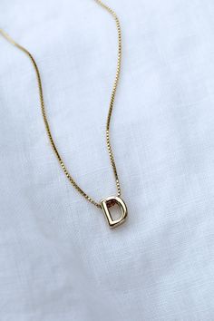 Our Initial Bar Charm is perfect for adding a personal touch to your current initial slide necklace. This charm is crafted from high-quality gold-filled materials and features a single initial bead. Upgrade your necklace with a special piece you'll treasure forever. *Chain & Spacer Sold Separately* 14k Gold Filled Bf Gift, Preppy Necklaces, Gift Wishlist, Wooden Closet, Bf Gifts, Outfits Dresses, School Accessories