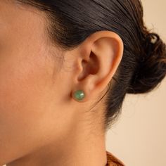 J A D E ∙ B E A D ∙ S T U D S Introducing our Jade Bead Stud Earrings, crafted with the revered gemstone known for its rich symbolism and unique properties. Jade is believed to promote harmony, balance, and good fortune, making these earrings not only a stylish accessory but also a meaningful addition to your wardrobe ♡   * Material: High Quality Solid 925 Sterling Silver  * Finish: Sterling Silver ∙ 18K Gold * Featuring spherical ~8.5mm Jade CZ Gemstone Stud Earrings | Sold as a Pair  ♡ Model s Jade Earrings Stud, Green Earrings For Everyday, Green Minimalist Pierced Earrings, Minimalist Green Pierced Earrings, Classic Single Green Earring, Classic Everyday Earrings For May Birthstone, Green Hypoallergenic Minimalist Earrings, Classic Green Single Earring, Green Pierced Everyday Earrings