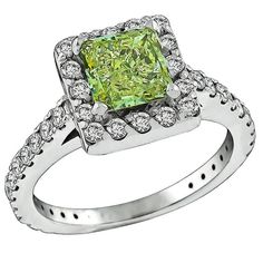 This stunning 14k white gold ring is centered with a lovely GIA certified princess cut natural fancy light even color diamond that weighs 1.18ct. graded with SI1 clarity. The center stone is accentuated by dazzling round cut diamonds weighing approximately 0.75ct. graded G color with VS clarity. The ring is size 5 1/4, and can be resized. Inventory #71752ASSS Diamond Gold Engagement Ring, Fancy Light, Fancy Lights, Fancy Diamonds, Diamond Gold, Gold Engagement Ring, 14k White Gold Ring, Engagement Rings Sapphire, Gold Engagement