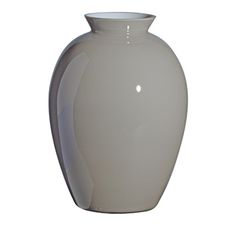 a white vase is shown on a white background