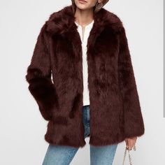 Product Details Fits 2 Size Up To Size. Model Measurements: 5'10" Height, 33.5" Bust, 23.5" Waist, 34.5" Hips, Wearing A Size Small Or Medium Oversized Lapels Long Sleeves Pockets At Sides Faux Fur Lined Made In Usa Material & Care Faux Fur: 100% Polyester Lining: 100% Polyester Excellents Conditions Like New Never Worn Chic Fitted Fur Coat For Fall, Chic Solid Faux Fur Outerwear, Trendy Faux Fur Trim Outerwear For Fall, Solid Outerwear With Faux Fur Trim For Fall, Trendy Fall Outerwear With Faux Fur Trim, Fall Solid Color Outerwear With Faux Fur Trim, Spring Faux Fur Outerwear With Pockets, Chic Fur Coat With Pockets For Fall, Fitted Faux Fur Outerwear For Cold Weather