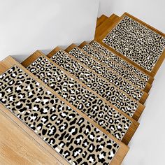 a set of leopard print steps leading up to the top