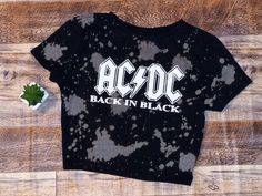 ACDC 80s Crop Top Fan Merch Rock Band AD ORIGINAL STYLE & COLOR IS BLACK BLEACHED CREW NECK CROP TOP Choose between V-Neck or Crew Neck Crop Tops Adult Sizes, Cotton/Polyester Blend. Black Font will be changed to white font if you order a black crop top to be more visible. CUSTOM ORDERS WELCOMED. We Carry Women Adult Sizes. All sizes, colors and options will be listed according to our inventory. SHIPPING FAST, FREE AND SAFELY IS OUR MAIN PRIORITY. WE LOVE ALL OUR CUSTOMERS AND TREAT THEM LIKE FA Trendy Bleached Tops For Streetwear, Rocker Distressed Crew Neck Top, Casual Acid Wash Top For Concert, Acid Wash Band Merch Tops For Music Festival, Edgy Band Logo Tops For Summer, Casual Band Logo Tops For Concerts, Rocker Distressed Short Sleeve Tops, Band Logo Cotton Tops For Festival, Black Rock Style T-shirt For Festival