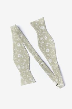 If you're into the simple looks but with a little twist, this floral is for you. The subtle floral pattern makes for an elegant and well put-together look. Sport this number at your next wedding, office event, or evening out. Semi-formal Spring Ties, Elegant Green Tie For Spring, Classic Formal Ties With Floral Print, Elegant Green Spring Ties, Elegant Green Ties For Spring, Elegant Spring Party Ties, Elegant Green Summer Tie, Elegant Green Summer Ties, Classic Spring Bow Tie