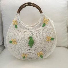 From My 2021 Resort Collection, This Handbag Is White Woven Raffia With A Handmade / Hand Painted Ceramic Tropical Green Bird, Painted Cowrie Shells And Embroidered Tropical Leaves. Fully Lined With Interior Pocket. One Of A Kind! Nwt Spring Cream Bag With Bamboo Handle, Casual Beach Crochet Bag With Detachable Handle, Cream Bags With Bamboo Handle For Spring, Casual Crochet Beach Bag With Detachable Handle, White Handheld Crochet Bag For Beach, White Handheld Crochet Bag For Vacation, White Handheld Crochet Beach Bag, White Handheld Crochet Bag For The Beach, Cream Top Handle Straw Bag For Beach