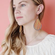 These Remedy earrings are perfect for any BOHO fashion lover! The beautifully colored threads woven with a glimmery golden fiber amongst the rustic hardware create the perfect blend of beauty and fashion. You are sure to turn heads and feel confident all day wearing these stunning earrings. Colorful threaded drop earrings add the perfect pop to any outfit. Measures approximately 2.75 inches. Weighs approximately .3 ounces *Colors may vary depending on screen calibration. Rustic Hardware, Earrings Colorful, Triangle Earrings, Beauty And Fashion, Gold Threads, Everyday Earrings, Stunning Earrings, Gorgeous Earrings, How To Feel Beautiful