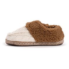 Cozy into a pair of Muk Luks Moselle slippers, and let the faux shearling cuff keep your feet warm and happy all season long. The supportive foam footbed and indoor/outdoor sole guarantee you'll want to wear these all day. Features: Faux Fur LinedBase Material: 100% AcrylicUpper/Outer Base Material: 100% AcrylicShoe Lining Material: PolyesterSole Material Content: 100% Thermoplastic-RubberCare: Hand WashCountry of Origin: Imported Cozy Winter Slippers With Round Toe, Cozy Brown Slippers For Winter, Cozy Slippers With Cushioned Footbed And Round Toe, Cozy Synthetic Slippers With Round Toe, Cream Round Toe Indoor Slippers, Cozy Winter Clogs With Rubber Sole, Cozy Winter Slippers With Rubber Sole, Beige Synthetic Indoor Slippers, Comfy Brown Winter Slippers