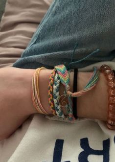 Surfer Bracelets Aesthetic, Multiple Bracelets Aesthetic, Bracelet Asethic, Cute Bracelets Aesthetic, Pura Vida Bracelet Stack, Handmade Bracelets Aesthetic, Layered Bracelets Aesthetic, Beach Bracelets Aesthetic