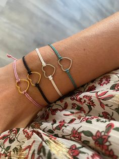 Small bracelet with heart charm in stainless steel * Choose the thread color of your choice * All bracelets are adjustable 〰️ Do not hesitate to contact me for further information and possibly customization of the model and/or colors 🤍 * DELIVERY 📦 Shipping within 5 days maximum, Creations made to order Follow me on the networks 🌷: Instagram: BijouxLettyM Facebook: Letty M Jewelry Gift idea for birthday, Christmas, Valentine's Day, Mother's Day, etc. Casual Stainless Steel Bracelets For Gift, Casual Stainless Steel Bracelets As Gift, Casual Stainless Steel Bracelet As Gift, Dainty Adjustable Stainless Steel Charm Bracelet, Adjustable Heart-shaped Stainless Steel Charm Bracelet, Adjustable Heart Shape Stainless Steel Charm Bracelet, Adjustable Dainty Stainless Steel Charm Bracelet, Everyday Metal Bracelets With Sliding Knot, Adjustable Pink Stainless Steel Charm Bracelet