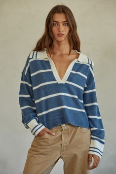 -Color: Blue Ivory -Collar detail -Striped -Runs true to size -Content: 68% Acrylic 28% Polyester 4% Spandex -Hand wash/Flat dry -Imported -Model is wearing size Small Graphic Dress, Sweater Jumpsuit, Denim Accessories, Collar Sweater, Tops Fall, Blue Ivory, Knitted Pullover Sweaters, Retro Look, Cardigan Jacket