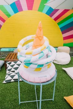 an inflatable cone sits on top of a small table