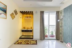 a bathroom with a sink, window and rug on the floor in front of it