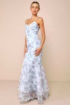 Everyone will be awed by your beauty when you stroll into the venue wearing the Lulus Pure Splendor Light Blue Floral Organza Trumpet Maxi Dress! Airy woven organza boasts a gorgeous floral print as it shapes adjustable spaghetti straps and a princess-seamed bodice with a V-neckline. Fitted waist tops a figure-skimming skirt that has a trumpet silhouette and ends at a tiered, flaring maxi hem. Hidden zipper/clasp at back. Fit: This garment fits true to size. Length: Floor length. Size medium mea Fitted Floor-length Organza Dress, Fitted Blue Organza Evening Dress, Fitted Organza Evening Dress Maxi Length, Elegant Floral Print Organza Gown, Floral Print Organza Wedding Dress, Blue Organza Gown For Spring, Floor-length Organza Bridesmaid Evening Dress, Blue Floral Print Evening Dress For Wedding, Bridesmaid Evening Dress With Fitted Bodice In Organza