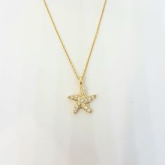 -The Starfish - Sea Star design with zirconia stones women jewelry pendant necklace is made with high-quality 14K real solid gold. - This dainty, cute, charm, delicate and trendy pendant necklace has been artfully designed for timeless yet modern millennial fashion. - This 14K real solid gold pendant comes with a beautiful matching 14K real gold chain. - You receive the pendant in a beautiful and free gift box - Free shipping (Arrive within 4 business days to USA and Canada ( 1 day for productio Yellow Gold Starfish Necklace As Gift, Yellow Gold Star Necklaces With Starfish Charm, Gold Starfish Charm Necklace Gift, Trendy Pendant Necklace, Millennial Fashion, Snowflake Bracelet, Real Gold Chains, Ocean Necklace, Artfully Designed