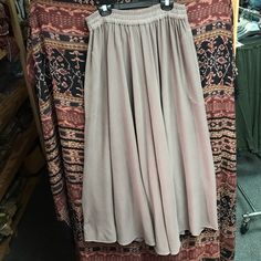 Moroccan Cotton Rayon Blend Flowy Beige Maxi Skirt With Elastic Waistband, Long Flowy Skirt With Elastic Waistband, Beige Wide Leg Maxi Skirt With Elastic Waistband, Beige Long Skirt With Lining, Beige Flowy Long Skirt, Beige Lined Flowy Skirt, Beige Long Skirt With Elastic Waistband, Beige Flowy Maxi Skirt With Lining, Beige Flowy Skirt With Elastic Waistband