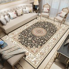 a living room filled with lots of furniture and rugs on top of a floor