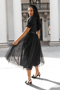 Delicate, yet bold; our Ballerina Dress was designed to steal the spotlight. Featuring soft black tulle, seams that flatter the bust, and a fun twist to puff sleeves. You will never want to take this beauty off. She is the perfect mix of charm and class, that will make you want to dance the night away. Black Ballerina Dress, Libby Dress, Giraffe Print Dress, Sheer Long Sleeve Dress, Knee Length Dresses Casual, Ivy City Co, Summer Shift Dress, Hollywood Dress, V Dress