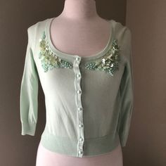 Not Green Embellished Cardigan. Gorgeous Detailing. Brand New With Tags. Size Small. Extra Button And Thread Included. Fitted Embellished Tops For Spring, Spring Fitted Embellished Cardigan, Fitted Embellished Spring Cardigan, Mint Green Accessories, Crop Knit Sweater, Mint Green Cardigan, Faux Fur Cardigan, Cream Knit Cardigan, White Sweater Cardigan