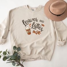 Our fall leaves and pumpkin spice latte coffee cup shirt is a great addition to your fall tee collection! Perfect for all of your fall activities: grabbing coffee, hanging out at the ball field, or under a cute jacket or sweater by the bonfire! Makes a great gift too! SIZE UP for an OVERSIZED FIT (see size chart in listing photos). Are you looking for additional Fall or Halloween themed graphic tees? Check out the following: https://www.etsy.com/shop/TheGraphicPeach?ref=seller-platform-mcnav§ion Relaxed Fit Coffee Color Tops For Fall, Coffee-colored Graphic Print Sweatshirt For Fall, Coffee Colored Tops With Letter Print For Fall, Coffee Letter Print Tops For Fall, Fall Coffee Cotton Sweatshirt, Fall Cotton Coffee Sweatshirt, Coffee Cotton Sweatshirt For Fall, Coffee Color Cotton Sweatshirt For Fall, Casual Coffee Sweatshirt For Fall