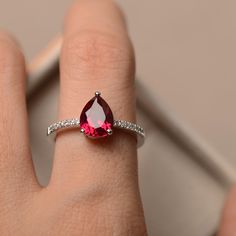 Lab ruby ring pear cut red gemstone ring sterling silver | Etsy Formal Pear-shaped Ruby Ring, Formal Red Pear-shaped Ruby Ring, Classic Ruby Ring With Pear-shaped Stone, Classic Pear-shaped Ruby Ring With Prong Setting, Red Pear-shaped Ruby Ring, Classic Pear-shaped Ruby Ring, Formal Teardrop Ruby Ring In Fine Jewelry Style, Teardrop Ruby Ring For Formal Occasions, Formal Teardrop Ruby Ring Fine Jewelry