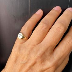 "Pinky ring, 14K solid gold ring. delicate, dainty and light Can be Engraved with letter, Initials in any language ✔ Made to Order ✔ Gold K: 14K ✔ Metal stamp: 14K ✔ Gold Color: Yellow Gold ✔ Ring size: Available in all ring sizes ✔ Face of the ring: 7mm ✔ Gold weight: 1.6 gram * ✔ Ready to Ship in 3-5 Business Days * The gold weight is for a 14k ring. A small difference that might occur depending on the size. Choose your size , and your word / name - in any language let me know in the \"note to 14k Gold Dainty Initial Ring With Polished Finish, Dainty 14k Gold Initial Ring With Polished Finish, Dainty Initial Ring With Polished Finish, Everyday Yellow Gold Polished Initial Ring, Dainty Sterling Silver Initial Ring Stamped 14k, Heirloom 14k Gold Initial Ring For Everyday, Dainty White Gold Initial Ring Stamped 14k, Everyday Yellow Gold Signet Ring With Initials, Dainty Hallmarked Signet Ring