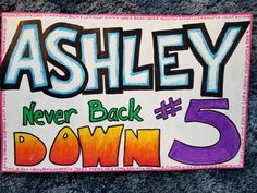 a sign that says ashley never back down 5