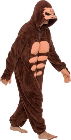 a man in a monkey costume is walking with one foot on his hip and the other hand on his hips