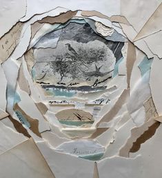 torn up paper with pictures and writing on it, including trees in the middle surrounded by other papers