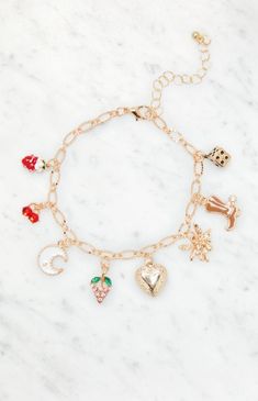 Bring a sweet touch to your look with the LA Hearts Strawberry Charm Bracelet. This bracelet is complete with a gold finish, an adjustable closure, and cute little charms.Gold chain designAdjustable lobster clasp closureCharm details LA Hearts Womens Strawberry Charm Bracelet - Gold Strawberry Bracelet, Bracelets Aesthetic, Strawberry Charm, Gold Chain Design, Gold Charm Bracelet, Cute Bracelets, Jewelry Inspo, Bracelet Gold, Heart Jewelry