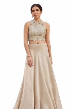 Beige champagne tissue silk padded crop top with zardosi, french knots, aari and 3D floral embroidery. Comes with a skirt with an attached cancan. - Aza Fashions Elegant Fitted Crop Top For Festive Occasions, Elegant Festive Evening Crop Top, Beige Fitted Choli For Party, Elegant Silk Crop Top, Beige Fitted Lehenga For Party, Elegant Satin Choli For Reception, Elegant Festive Crop Top For Wedding, Desi Fits, Crop Top And Skirt Set