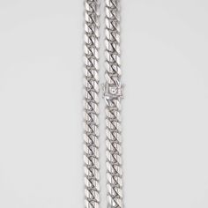 ***NEW*** Our most exclusive, HEAVY, solid silver high end, Italian made chain. Designed to be worn at work, gym, and an evening out, your unique pieces are made to live with you, from the classic every day to modern statement. We only use the finest precious metals in our chains. These chains are hand made with fine 925 solid silver and we top it off with a rhodium coat to provide a resistance for tarnishing. All of our pieces can be worn alone and complement each other for a perfect stack. Classic White Gold Chunky Chain Jewelry, Classic White Gold Jewelry With Chunky Chain, Elegant Cuban Link Necklace With Solid Construction, Classic Cuban Link Necklace With Polished Finish, Classic Polished Cuban Link Necklace, Classic Cuban Link Necklace With Oval Links, Classic Cuban Link Necklace With Chunky Chain, Classic Cuban Link Necklace With Silver Chain, Classic Cuban Link Silver Necklace