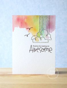 a card with the words thanks for being awesome written in black ink and watercolor