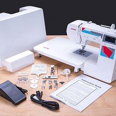 the sewing machine is set up with all its accessories and tools needed to sew