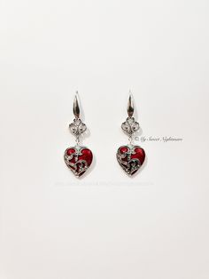 ◆ Gothic earrings with red heart The heart measures 0,905512 x 0,826772 inches and it's a really bright and intense red, the jewel is entirely silver plated The hooks are in 316 stainless steel, commonly called surgical steel and it is the "purest" steel on the market, a very corrosion resistant metal completely hypoallergenic and does not tarnish over time. ♡ In my shop there are many handmade jewelry for all tastes, come and watch them you are welcome! ♡ ❤ Do you need a custom order? ❤ You can