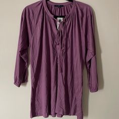 3/4 Sleeve Gap Blouse Brand New With Tag. Beautiful Purple Color With A Little Tie Up At The Neck. Gap Short Sleeve Beach Tops, Gap Short Sleeve Tops For Beach, Gap Short Sleeve Tops For The Beach, Casual Spring Tunic Shirt, Casual Half Sleeve Tunic For Spring, Spring Purple Half-sleeve Blouse, Spring Purple Half Sleeve Blouse, Spring Casual Tunic With 3/4 Sleeves, Casual Spring Tunic With 3/4 Sleeves