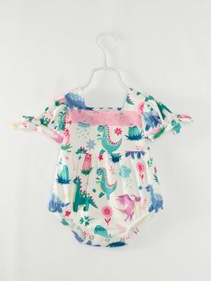 "Your little one will be cute as a peach in this romper made of soft milk silk. Perfect for playtime or naptime, this romper is as sweet as it is comfortable. No sour grapes here, just pure cuteness!" 97% polyester 3% spandex Care instructions: Cold wash, gentle cycle, hang dry or tumble dry low inside out, do not bleach, do not iron. Playful Bubble Romper For Playtime, Cute Cartoon Print Summer Bodysuit, Green Playful Bubble Romper For Playtime, Pink Printed Onesie For Summer, Cute Green Bubble Romper For Playtime, Playful Short Sleeve Bubble Romper For Spring, Green Short Sleeve Bubble Romper For Spring, Summer Pink Printed Onesie, Spring White Bodysuit With Cartoon Print