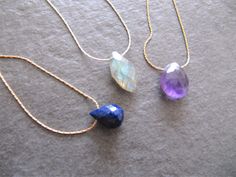 Minimalist gemstone drop stone necklace, available in sterling silver or 14k gold filled. This necklace is available with a lapis lazuli stone, amethyst stone or labradorite stone. The stone can move freely on the snake chain.  Each necklace has a 4 cm / 1,6 inch extension chain so you will be able to wear the necklace in different lengths.  Packaging: Your order will be packaged in a jewelry box. To avoid packaging waste, multiple pieces will be wrapped in one box.  If you want each piece wrapp 14k Gold Jewelry With Natural Stones, Dainty 14k Gold Jewelry With Natural Stones, Delicate Everyday Gemstone Jewelry, Spiritual Yellow Gold Jewelry With Gemstones, Spiritual 14k Gold Gemstone Jewelry, Everyday 14k Gold Gemstone Jewelry, Elegant Oval Gemstone Beads Jewelry, Yellow Gold Dangle Birthstone Jewelry, Everyday Oval Birthstone Jewelry