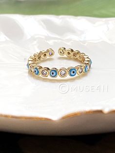 Evil Eye Ring, Minimalist Ring, Gold Ring, Dainty Ring, Stackable Ring, Dainty Evil Eye Ring, Gold Stacking Ring, Evil Eye Protection. This dainty Evil eye beaded gemstone ring is great for stacking style or wear it solo. *Listing is for ONE RING ---------------------------------------- EVIL EYE The symbol and superstition of the evil eye is one of the strongest symbolic images in the world. Yet, despite the differences in the cultures which hold the evil eye myth, it retains largely the same me Blue Eye Ring, Evil Eye Ring Gold, Buddha Pendant Necklace, Gold Stacking Ring, Evil Eye Protection, Bff Gift, Evil Eye Ring, Buddha Pendant, Yoga Jewelry