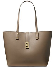 MICHAEL Michael Kors Karson Carryall Leather Tote Handback Color:  Dark Dune/Gold MSRP: $298.00 Carry it all with this chic, everyday tote,  crafted from sturdy leather. Extra-large sized bag; 18"W x 11"H x 5"D  10"L handles Turnlock closure Gold-tone exterior hardware Laptop compatible (std. size 13"-15") Leather Carryall Tote, Everyday Tote, Monogrammed Items, Mens Gift Sets, Pump Sandals, Baby Clothes Shops, Dresses With Leggings, Travel Luggage