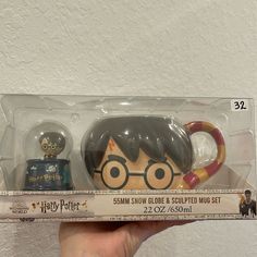 the harry potter figurine is in its packaging