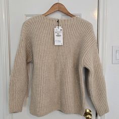 Size Xs-S Sweater With Wide Round Neckline And Long Sleeves. Cream Color Approx Lenght From Neck To Bottom Of Sweater - 23" Apporox Width Of Sweater From - 20" Item # 5755/104/806 Casual Chunky Knit Stretch Top, Casual Fitted Chunky Knit Top, Fitted Casual Chunky Knit Top, Casual Beige Knit Top For Winter, Zara Trendy Cream Sweater, Trendy Zara Cable Knit Sweater, Zara Ribbed Sweater For Winter, Casual Cream Knit Top For Winter, Trendy Zara Knit Top For Winter