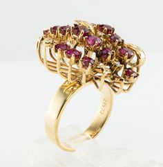 Genuine Ruby Ring, Floral Ring, July Birthstone, Flower Ring, 14K Gold Ring, Natural Ruby, Natural Diamond Ring, Estate Ring, Cocktail Ring, Red Ring. This beautiful vintage ring is finely crafted in solid 14K Yellow Gold and it is also numbered inside of the shank. This colorful ring has Twenty-two genuine Earth mined Rubies measure from 2mm to 3mm, they are high-quality gems with great intensity and very strong brilliance. Eight small but white and fiery genuine diamonds are estimated to be VS Formal Cluster Ruby Ring, Vintage Multi-stone Ruby Ring In 14k Gold, Yellow Gold Flower Ring With 17 Jewels For Anniversary, Vintage Ruby Cluster Ring With Center Stone, Formal Cluster Ruby Ring With Gemstone, Formal Cluster Ruby Ring With Prong Setting, Formal Multi-stone Yellow Gold Flower Ring, Vintage Yellow Gold Flower Ring With Gemstone, Yellow Gold Cluster Flower Ring