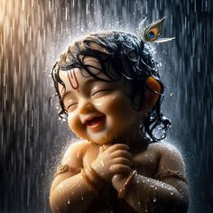 a baby laughing in the rain with a bird on his head and wings above its head