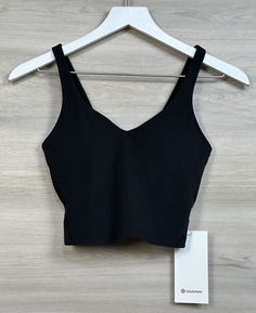 Lululemon Align Tank *Nulu Size 4 A/B Cup Black BLK 56439 011624CR1 Condition is New With Tags. Shipped with USPS. Will combine shipping on multiple purchases and refund any shipping overage on orders shipped within the US (Combined shipping not available for separate Ebay International Shipping Orders please contact me for a bundle listing) . Lulu Align Tank, Align Tank, Lululemon Align Tank, B Cup, Orders Shipped, Lululemon Align, Shipping Orders, Christmas Wishlist, Active Wear Tops