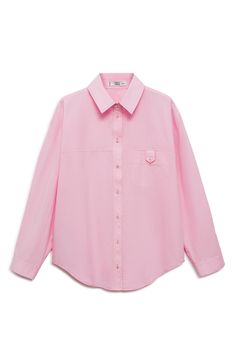 Relaxed and easygoing, this poplin button-up shirt features an oversized fit and a decorative button tab at the chest for a hint of workwear inspo. Front button closure Spread collar Long sleeves with button cuffs 100% cotton Machine wash, line dry Imported Trendy Spring Shirt For Workwear, Trendy Workwear Blouse With Buttoned Pockets, Trendy Spring Workwear Shirt, Trendy Blouse With Buttoned Pockets For Work, Oversized Spring Workwear Shirt, Oversized Shirt For Workwear In Spring, Oversized Shirt For Spring Workwear, Work Shirt With Snap Buttons, Solid Shirt With Snap Buttons For Work