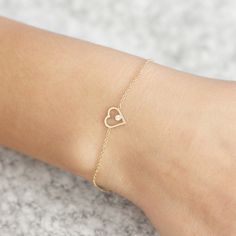 Heart Bracelet, Gold Heart Bracelet, Gold Diamond Bracelet, White Diamond Bracelet, Dainty Gold Bracelet, 14K Heart Bracelet, Stacking, Bracelet, Delicate Bracelet, Gift for Her Heart bracelet in 14k solid gold with a white diamond. A gold delicate bracelet for every day. 100% handcrafted with love! D E T A I L S ● Metal: 14K solid gold, 14K white gold or 14K rose gold ● Gemstone: Diamond ● Diamond's weight: 0.03ct ● Quality: color F-G, clarity VS, conflict free H O W ∙ T O ∙ O R D E R Choose fr Heart Bracelet Gold, Gold Diamond Bracelet, Gold Heart Bracelet, Dainty Gold Bracelet, Gold Heart Ring, Bracelets Gold Diamond, Rose Quartz Ring, Eternity Wedding Band, 14k Gold Ring